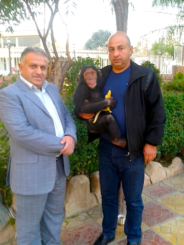 Dr. Sulaiman Tameer, on left, and Ramadan Hassan, on right, with Manno in 2014
